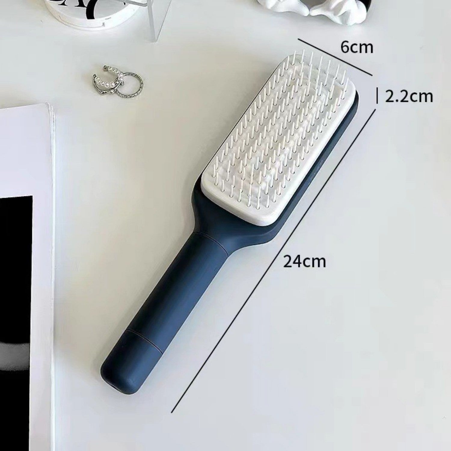 Retractable Rotating Comb for Anti-Tangle Styling